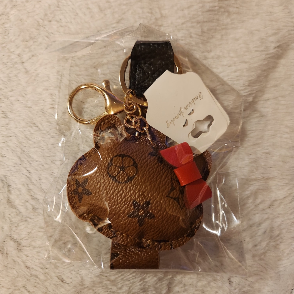 Brown and Red Keychain with Gold Accents
